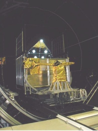 Carriage with telescope frame and videogrammetry equipment in the test chamber. Image courtesy of and © 2004 Alcatel Space.